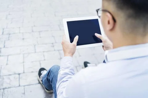 Man using a digital tablet Stock Photos
