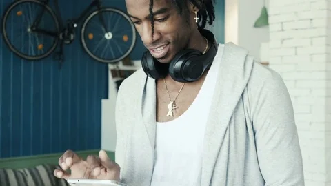 Man using display touchscreen tablet device in cafe. Digital screen touching Stock Footage 75903342