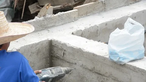 Man using drill on concrete Stock Footage 83782787