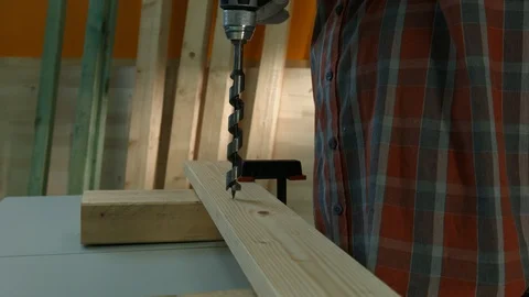 Man using a drilling machine in workshop Stock Footage 114712872