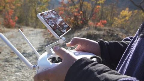 Man Using Drone Remote Controller Stock Footage 98000446