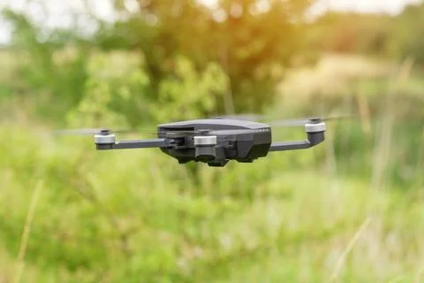 Man using a drone with remote controller  making photos and videos,  having.. Stock Illustration