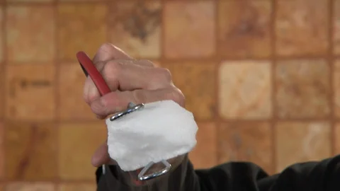 Man using dry ice during experiment Stock Footage 99047706