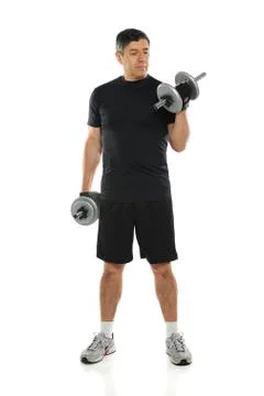 Man using dumbbells Stock Photos