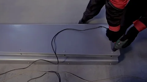 Man using an electric hand drill. Stock Footage