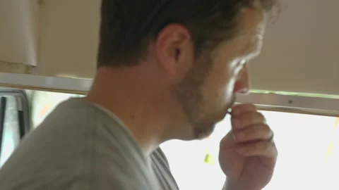 Man using an electric screwdriver to put screws in an aluminum strip 스톡 동영상 151518290