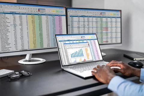 Man Using Finance Spreadsheet Report Stock Photos