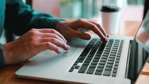 Man using finger typing on keyboard laptop computer on table. Stock Footage 105006814