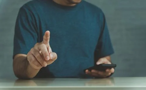 Man using fingerprint scan provides security access with biometrics identific Stock Photos