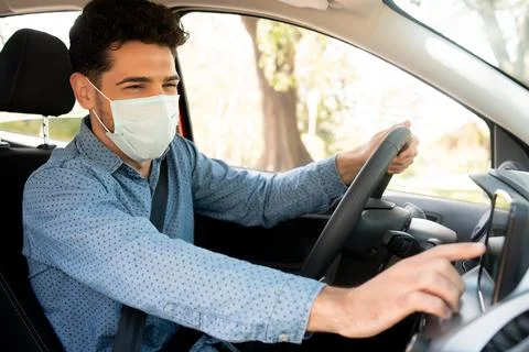 Man using gps navigation system in car. Stock Photos