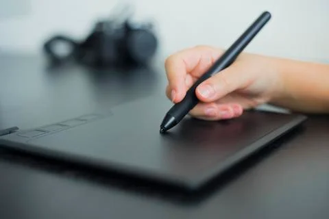A man using graphic tablet Stock Photos