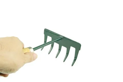 Man using green harrow on bottom left isolated Foto stock