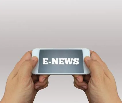 A man using hand holding the smartphone with text E-News on display Stock Photos