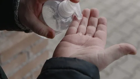 Man Using Hand Sanitizer Gel Stock Footage 126144035