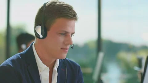 Man using headset to have phone call Stock Footage 168276341