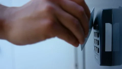 Man using his access card Stockbeeldmateriaal 75452963