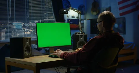 Man using his computer at home Stock Footage 105346508