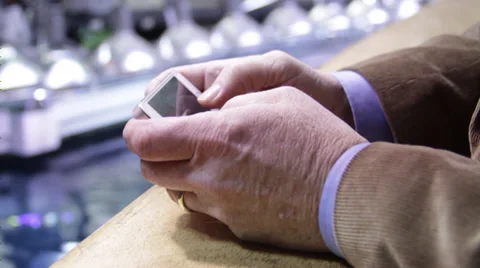 Man using his mobile phone interestingly Stock Footage 36155633