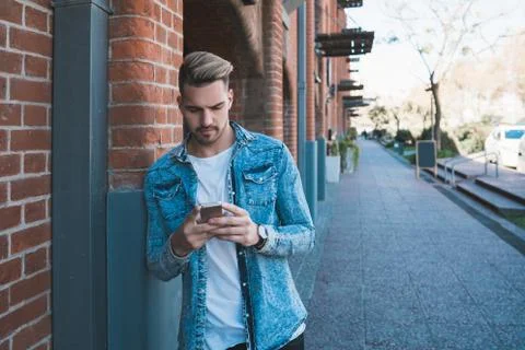 Man using his mobile phone. Stock Photos