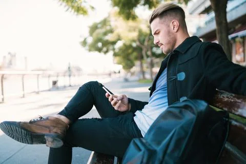 Man using his mobile phone. Stock Photos