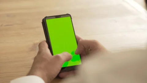 Man using his phone. green screen Stock Footage 95997349
