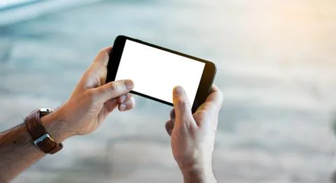 Man is using his smart phone. Clipping path included. 写真素材