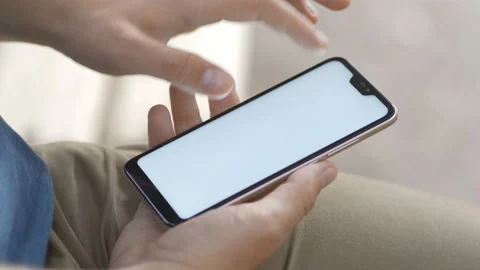 Man using his smartphone with to scroll on screen. Stock Footage 110425491