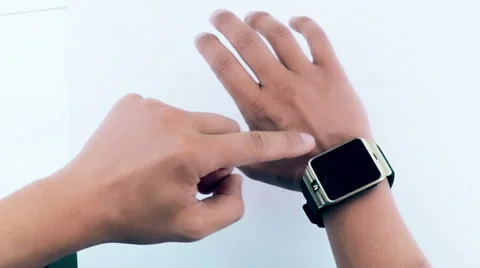 Man using his smartwatch app on white background Stock Footage 68510304