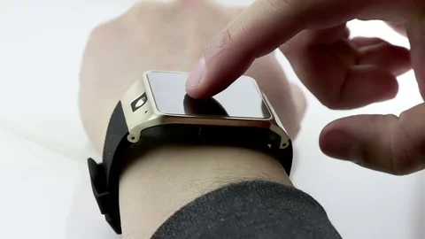 Man using his smartwatch app on white background, new technology Video stock 72291775