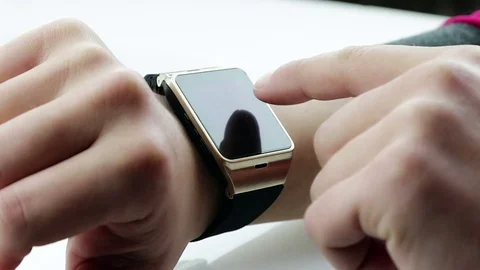 Man using his smartwatch app on white background Stock Footage 75084001