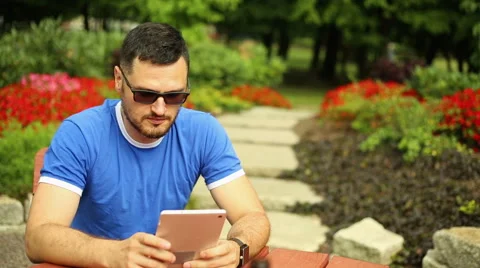 Man is using his tablet Stock Footage 65819107