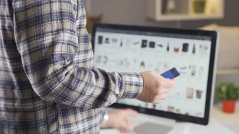 Man using instant mobile payment holding credit card. Online shopping. Stock Footage 224628583