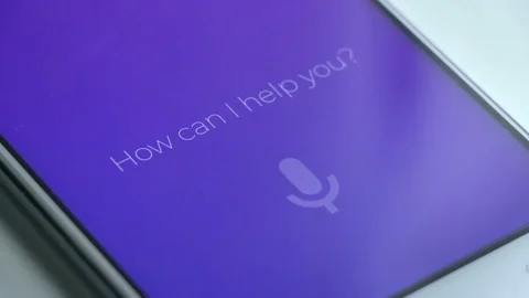 Man using intelligent personal assistant on smartphone. Voice assistant concept. Video stock 98631709