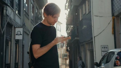 Man Using Internet Voice Search Technology On Mobile Phone recognition speech ai Stock Footage 97854699