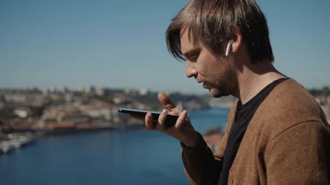 Man Using Internet Voice Search Technology On Mobile Phone recognition speech ai Stock Footage 97856428