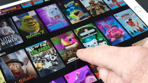 A man using iPad indoors 4K Stock Footage 195827195