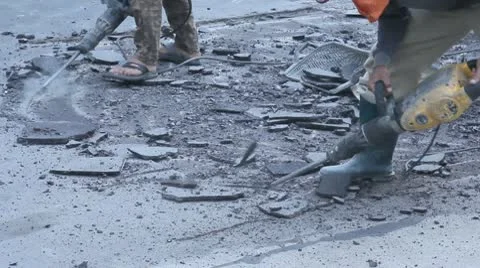 The man using Jack hammer breaking road surface. Stock Footage 10735572