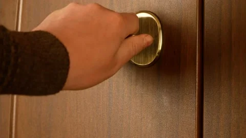 Man using a key to open the lock of the front door Stock Footage 157770718