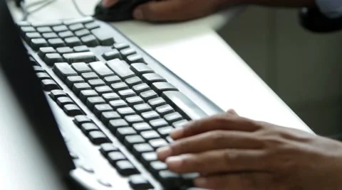 Man using keyboard. Stockbeeldmateriaal 55546737