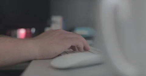 Man using keyboard in home office Stock Footage