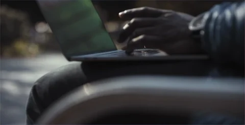 Man using keyboard laptop outside closeup Stock Footage 99264091