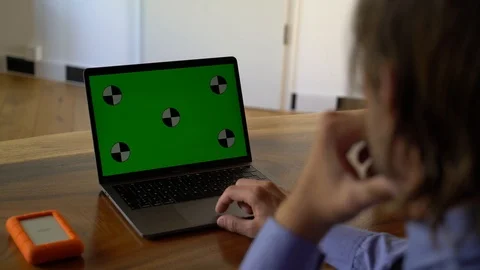 Man is using the keypad on a laptop with... | Stock Video | Pond5