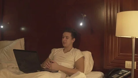 Man using laptop and has conversation via skype. Stock Footage 73984402