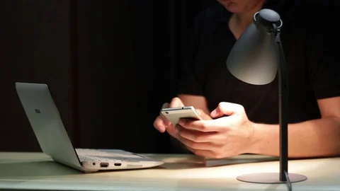 Man Using Laptop And Phone Stock Footage 70508110