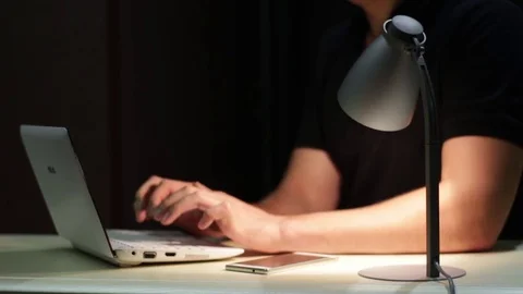 Man Using Laptop And Phone Stock Footage 70508251