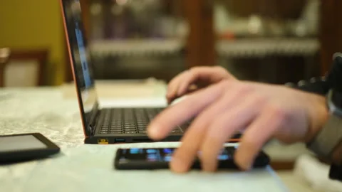 Man using laptop and smartphone for smart working from home,tech lifestyle 스톡 동영상 149177249
