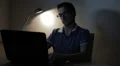 man using a laptop and surfing in internet ( facebook) HD Footage