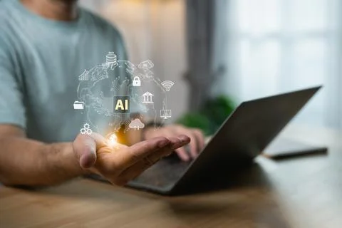 Man Using Laptop with Artificial Intelligence Icons in Hand and Digital Wor.. Stock Photos