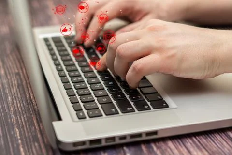 Man is using laptop with black keys, Social media and social networking.  Stock Photos