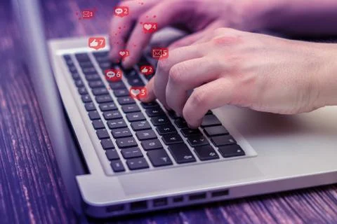 Man is using laptop with black keys, Social media and social networking.  Foto stock